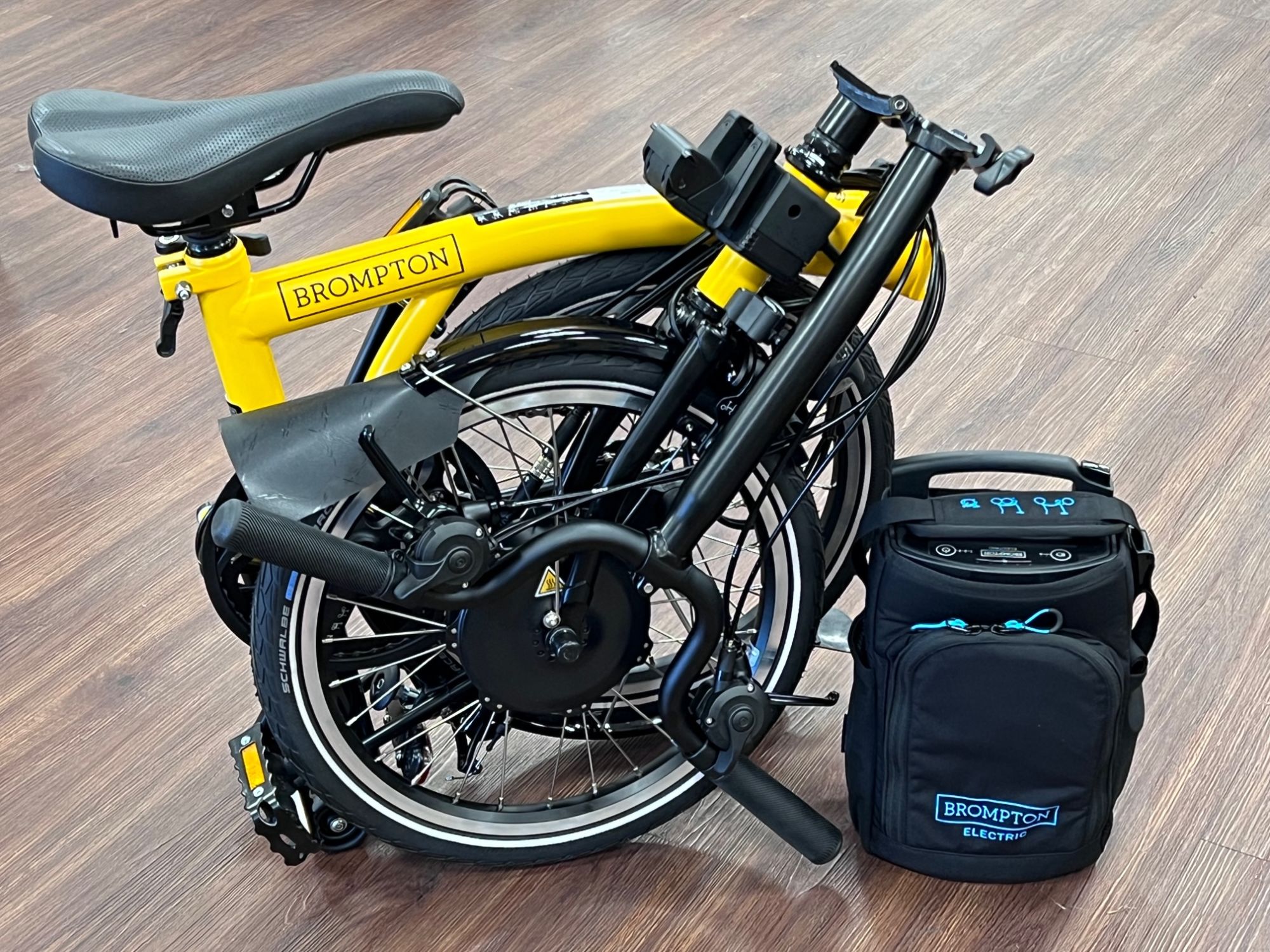 yellow brompton bike